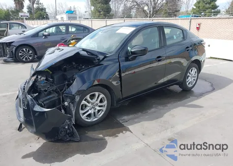 2018 Toyota Yaris Ia из США, поврежденный, VIN 3MYDLBYV3JY326808